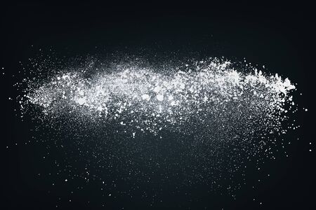 Dust or powder splash cloud isolated on black backgroundの写真素材