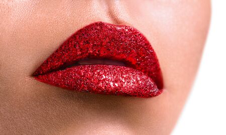 Closeup photo of lips with fashion red make upの写真素材