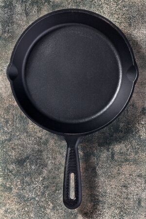 Abstract frying pan background on stone surfaceの写真素材