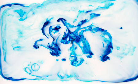 Abstract chaos ink in liquid paint backgroundの写真素材
