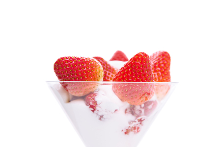 Strawberry with cream dessert isolated over white backgroundの写真素材
