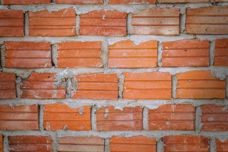 Abstract close-up photo of textured brick wall backgroundの写真素材