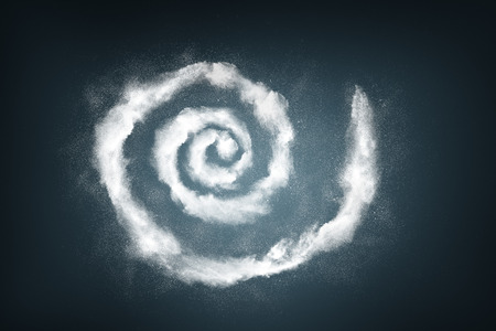 Abstract design of white powder particles explosion over dark backgroundの写真素材
