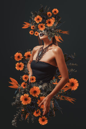A beautiful young woman, fashion portrait with flowers surrounding her.の写真素材