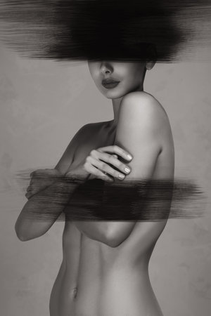 Artistic photograph of young woman with creative shadow effects. Beauty and fashion industry, or artistic publications.の写真素材