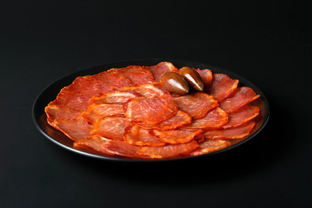 Portion of 100% acorn-fed Iberian loin from Extremaduraの写真素材