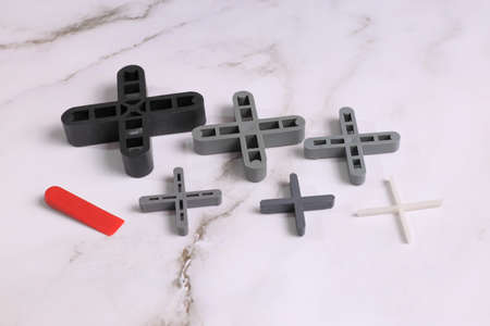 Spreaders and wedges for screed and tilesの写真素材