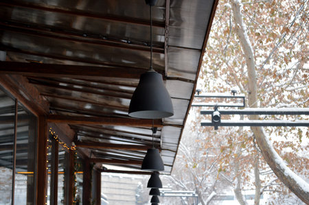 Decorative Black Pendant Lights in front of cafe