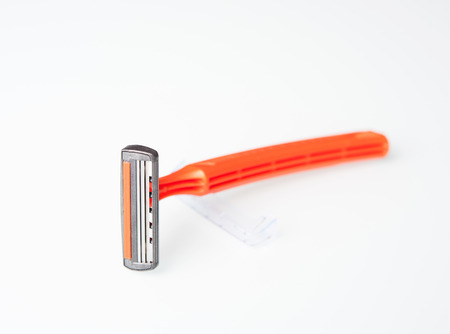 orange razor on the tableの写真素材