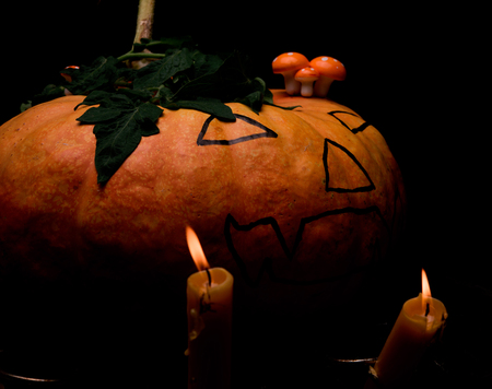 pumpkin for Halloween with candlesの写真素材