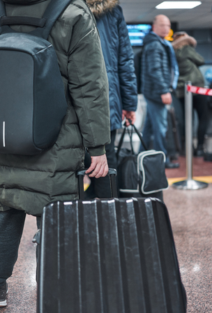 man with the suitcase at the airportの写真素材