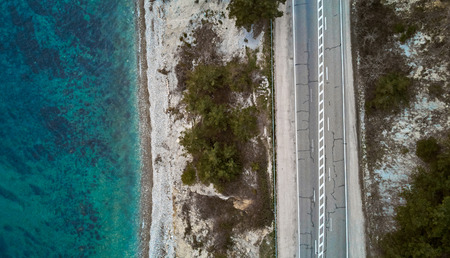 air view of the road by the sea with trucksの写真素材