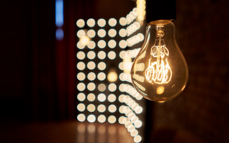 incandescent bulb on black backgroundの写真素材