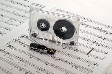 The music sheet tutorial solfeggio is a flash drive and cassette tapeの写真素材