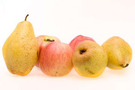 Fresh ripe apples and pears close-up on a white backgroundの写真素材