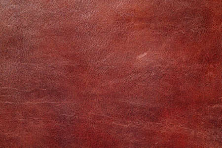 The background of natural processed leather brown closeupの写真素材