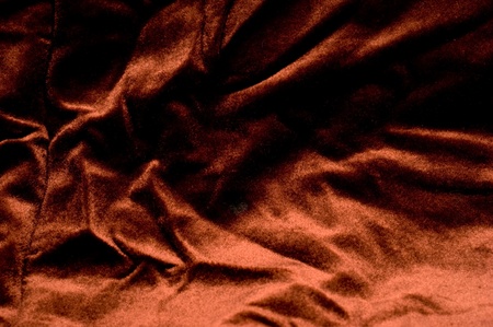 The background of textured brown synthetic fabric closeupの写真素材