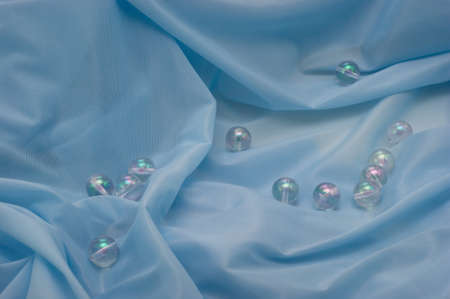 The background of textured blue synthetic fabric closeupの写真素材