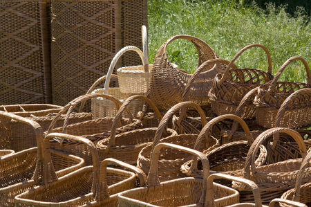 Traditional ukrainian handmade baskets of varying size made by weaving a wooden rod
