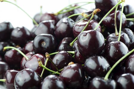 Cherries on a small vase closeupの写真素材