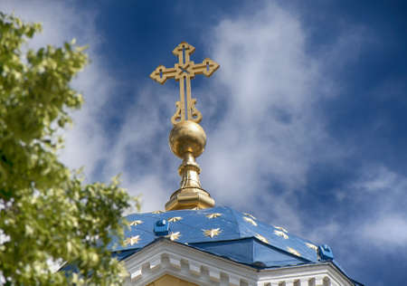 The dome and a cross of the Vladimir Cathedral in Kievの写真素材
