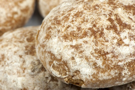 Honey gingerbread covered with icing sugarの写真素材