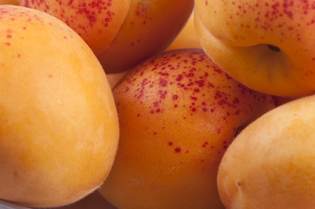 Bright yellow sweet ripe apricots close upの写真素材