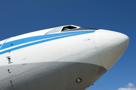 Bow of the aircraft against the blue skyの写真素材