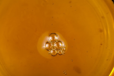 Sunflower oil in a glass cup close upの写真素材