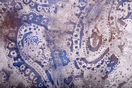 Background of the old fabric with an abstract pattern in purple tonesの写真素材