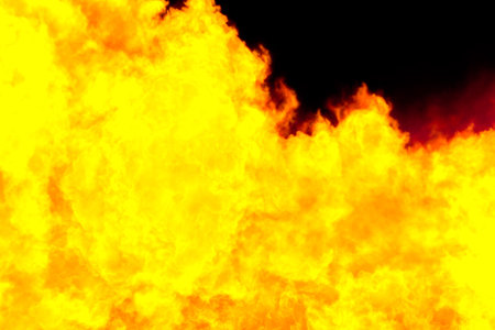 Fiery yellow background, computer simulation of a bright flame