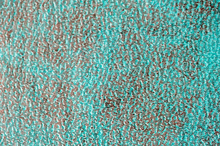 Abstract textural leather green background macro photo surface designer blank for the project