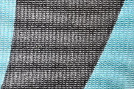 Knitted wool machine knitted close-up, the element of female dress macro photo color background