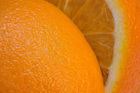 Sliced orange close-up full frame macro photo with great depth of field citrus backgroundの写真素材