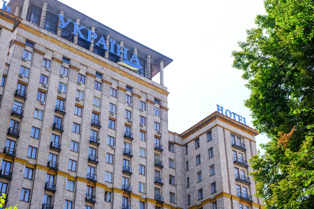 The facade of the hotel Ukraine in Kiev on Independence Square on a bright summer sunny dayのeditorial素材