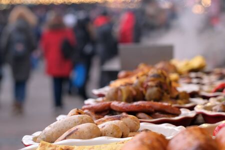 Street trading in Kiev, on January 7, 2020, grilled meat and vegetable snacks at Christmas festivitiesの写真素材
