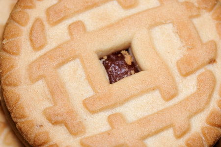 Shortcake sweet round double cookies with berry jam, close-up, macro photo