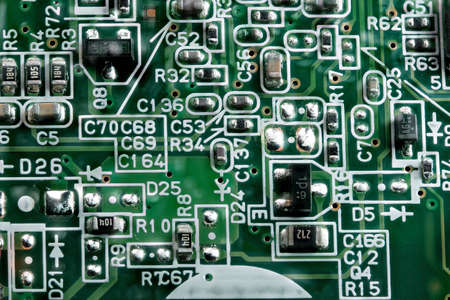 Fragment of electronic microcircuit of modern digital equipment close-up macro photographyの写真素材