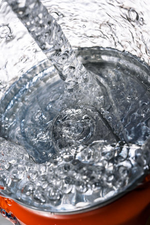 Small sprouts of plants on peat soil close-up macro photographyの写真素材