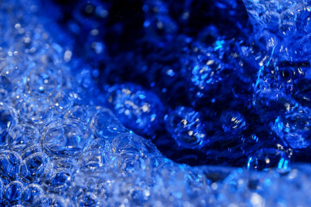Abstract texture art blue water background with air bubbles close-up macro photography