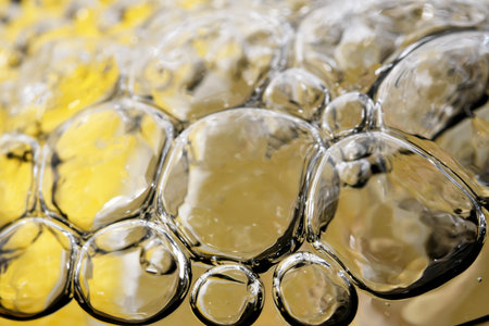 Abstract sweet cold lemonade with gas bubbles close-up macro photography