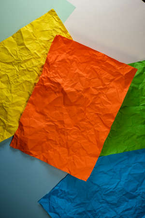 Colored paper background with red rectangular place for text in the centerの写真素材