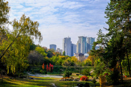 View of the residential area of the city of Kiev near the botanical garden on an autumn cloudy dayの写真素材