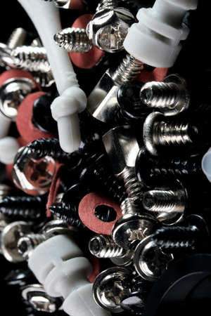 Bolts, screws, washers for assembly and installation of computer equipment close-up macro photographyの写真素材