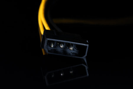 Computer connector on a black background for the functioning of digital equipment and data...