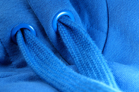 Textile blue background large knitted wool fabric, close-up background, macro photography