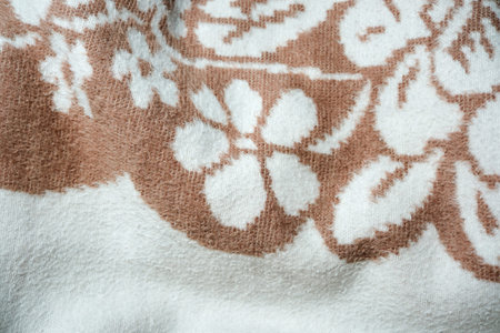 Delicate flowers create a subtle, inviting atmosphere in the room.