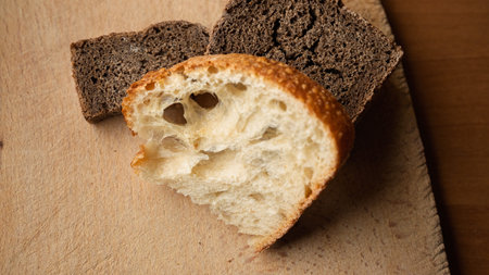 Artisan slices of bread showcasing a beautiful crust and texture.
