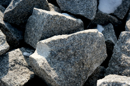 Gleaming stones lie scattered, illuminated by warm, radiant sunlight.の写真素材