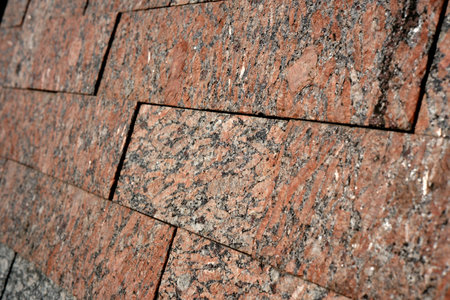 Beautiful granite tiles arranged in a stunning pattern, capturing light.の写真素材
